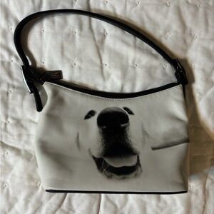 Woman’s Jeon Los Angeles small Purse Bag with a cute dog on both sides.